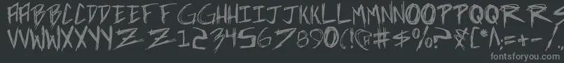incubus-fontti – harmaat kirjasimet mustalla taustalla