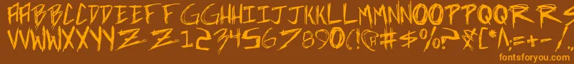 incubus Font – Orange Fonts on Brown Background