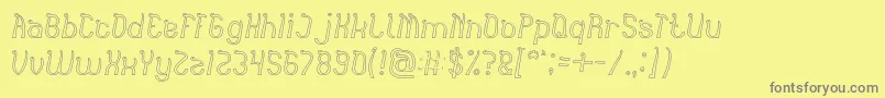 India Hair Style Hollow-fontti – harmaat kirjasimet keltaisella taustalla