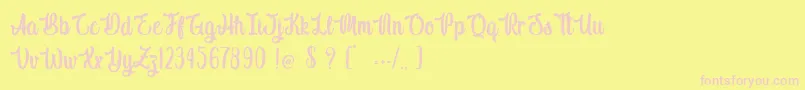 Indigo Daisy Font – Pink Fonts on Yellow Background