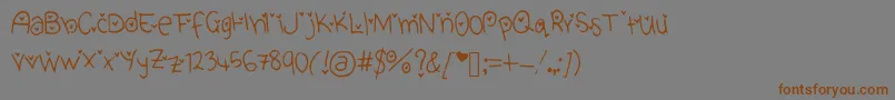 Шрифт CuteHeartFont – коричневые шрифты на сером фоне