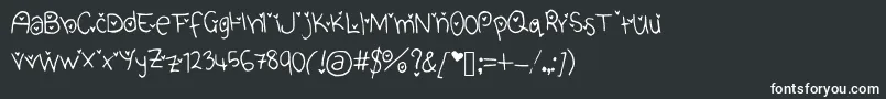 フォントCuteHeartFont – 黒い背景に白い文字