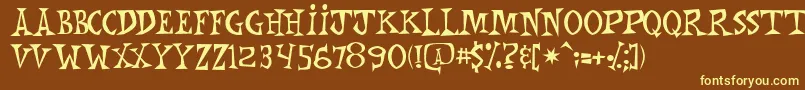 Fonte Mnkchunk – fontes amarelas em um fundo marrom