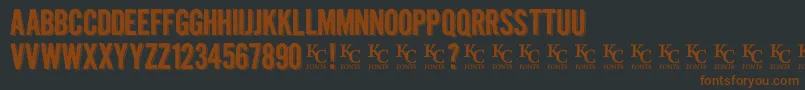 Kraftninedemo Font – Brown Fonts on Black Background