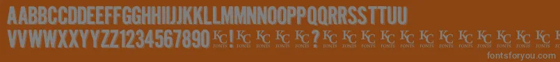 Kraftninedemo Font – Gray Fonts on Brown Background