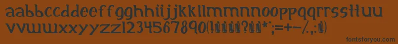 フォントinitial – 黒い文字が茶色の背景にあります