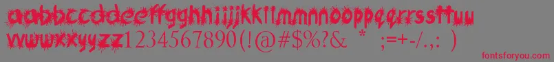 Ink Studio-Schriftart – Rote Schriften auf grauem Hintergrund