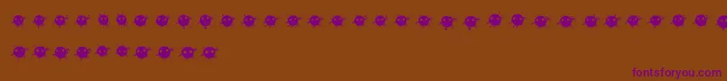 InkDrops-Schriftart – Violette Schriften auf braunem Hintergrund