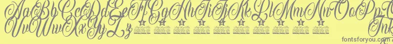 Inked Angels Personal Use-Schriftart – Graue Schriften auf gelbem Hintergrund