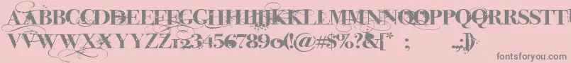 iNked God-Schriftart – Graue Schriften auf rosa Hintergrund