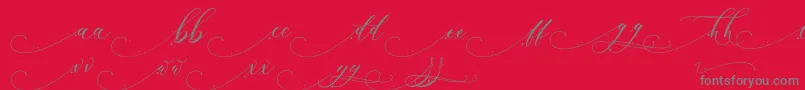 Inkland Font – Gray Fonts on Red Background