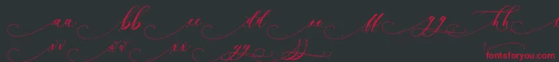 フォントInkland – 黒い背景に赤い文字