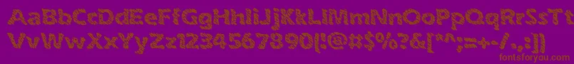 inkswipe-fontti – ruskeat fontit violetilla taustalla