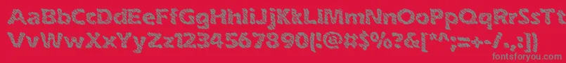 inkswipe-Schriftart – Graue Schriften auf rotem Hintergrund