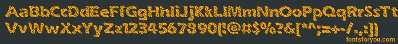 inkswipe-fontti – oranssit fontit mustalla taustalla