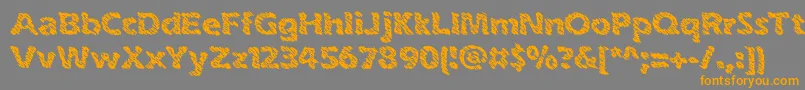 inkswipe-fontti – oranssit fontit harmaalla taustalla