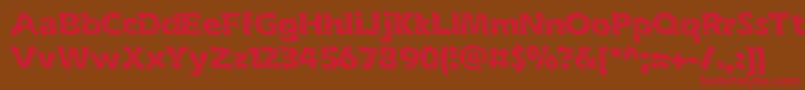 フォントinkswipe – 赤い文字が茶色の背景にあります。