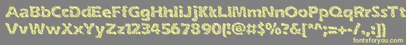 inkswipe-Schriftart – Gelbe Schriften auf grauem Hintergrund