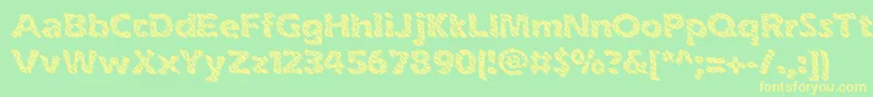 フォントinkswipe – 黄色の文字が緑の背景にあります