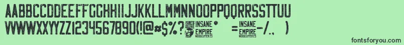 Fonte Insane Empire – fontes pretas em um fundo verde