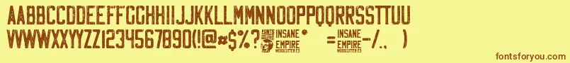 Insane Empire-Schriftart – Braune Schriften auf gelbem Hintergrund