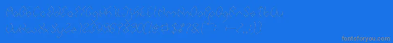 INSIDE THE BOX Italic-Schriftart – Graue Schriften auf blauem Hintergrund