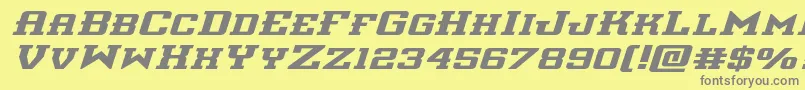 フォントinterceptorexpandital – 黄色の背景に灰色の文字