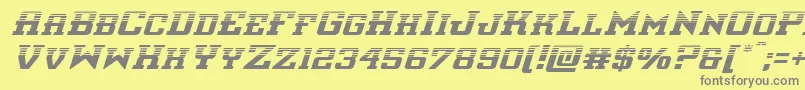 interceptorhalfital-Schriftart – Graue Schriften auf gelbem Hintergrund
