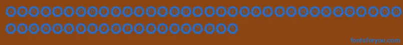 InternationalCapitals Font – Blue Fonts on Brown Background