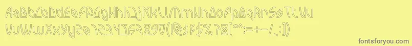 フォントINTERPLANETARY Hollow – 黄色の背景に灰色の文字