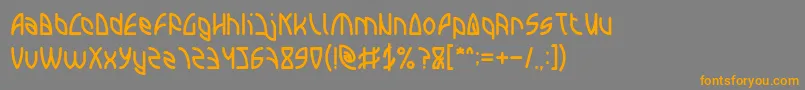 フォントINTERPLANETARY – オレンジの文字は灰色の背景にあります。