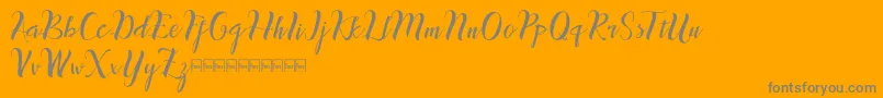 inthai-Schriftart – Graue Schriften auf orangefarbenem Hintergrund