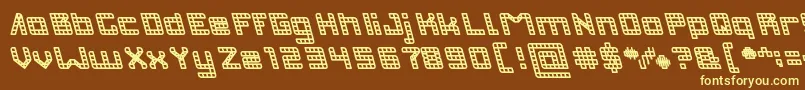 INVASION Bold-fontti – keltaiset fontit ruskealla taustalla