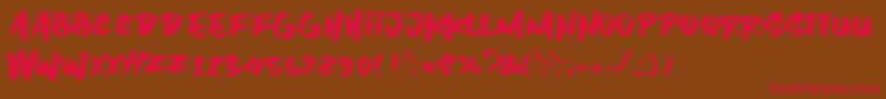 Inzomniac Font – Red Fonts on Brown Background