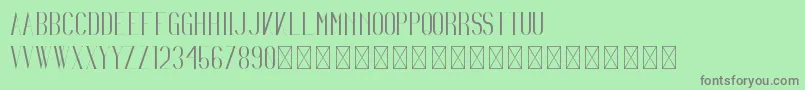 Irina PersonalUse-fontti – harmaat kirjasimet vihreällä taustalla
