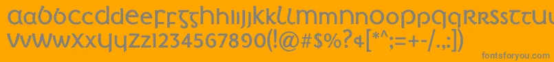 IrishPenny-fontti – harmaat kirjasimet oranssilla taustalla