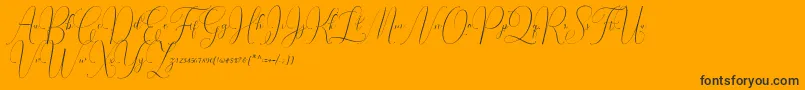 Czcionka Irlandia Script – czarne czcionki na pomarańczowym tle