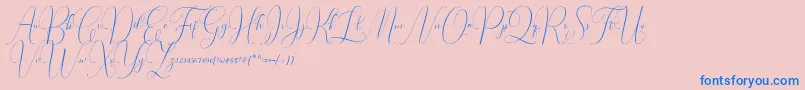 Czcionka Irlandia Script – niebieskie czcionki na różowym tle