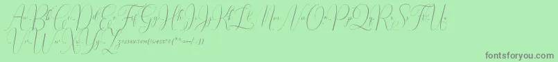 Irlandia Script-Schriftart – Graue Schriften auf grünem Hintergrund