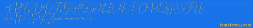 Irlandia Script Font – Orange Fonts on Blue Background
