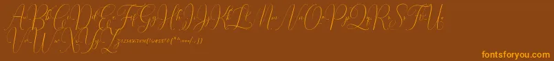 Irlandia Script Font – Orange Fonts on Brown Background