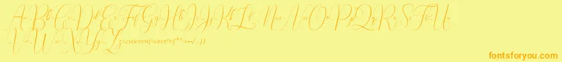 Irlandia Script-Schriftart – Orangefarbene Schriften auf gelbem Hintergrund