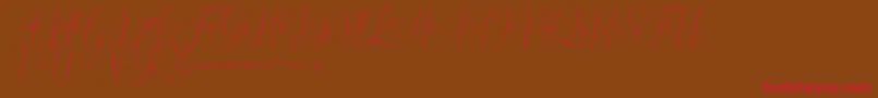 Irlandia Script Font – Red Fonts on Brown Background