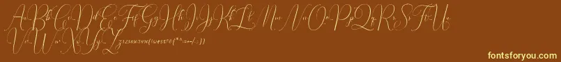 Irlandia Script Font – Yellow Fonts on Brown Background