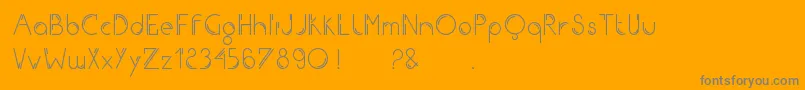 Iron-fontti – harmaat kirjasimet oranssilla taustalla