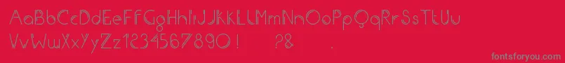 Iron-fontti – harmaat kirjasimet punaisella taustalla