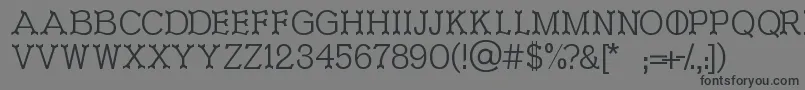 フォントIronworks – 黒い文字の灰色の背景