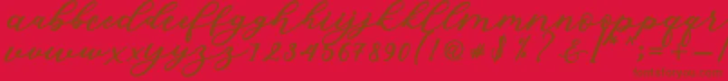 Fonte Isabella Script – fontes marrons em um fundo vermelho