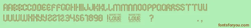 fuente Isometric Love – Fuentes Marrones Sobre Fondo Verde