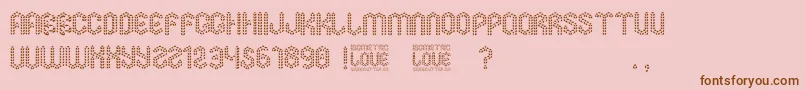 Isometric Love-Schriftart – Braune Schriften auf rosa Hintergrund